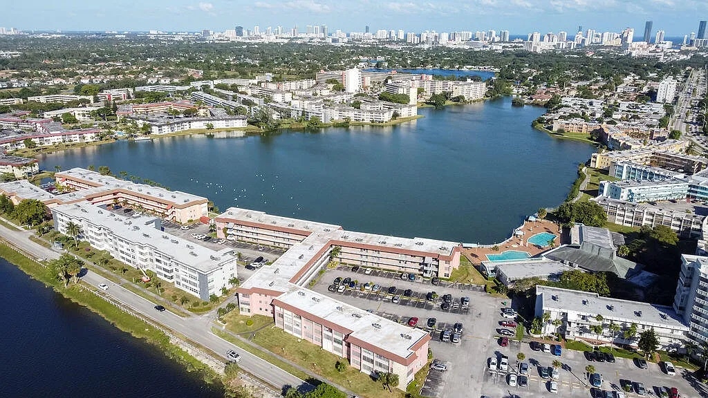 Aerial view of Sixth Moorings Condominium on the lake in Miami, Florida